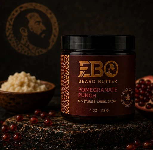 EBO Beard Butter — Pomegranate Punch jar photographed on black with gold light